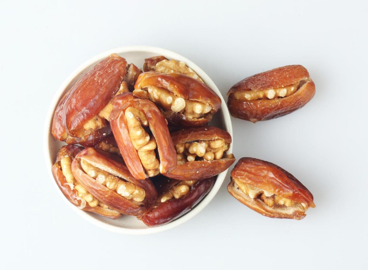 Palm date with walnut kernel dried nuts in bulk fragrant and sweet snacks nutritious and tasty with top quality for sale