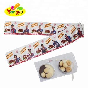 Mini cartoon cookiess with chocolate sweet candy in small heart shape tray