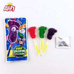 Halal fruit juice foot lollipop hard candy with mini glow stick and popping candy