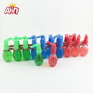 Plug-in four-color fruit-flavored cartoon grenade shape oral spray liquid candy