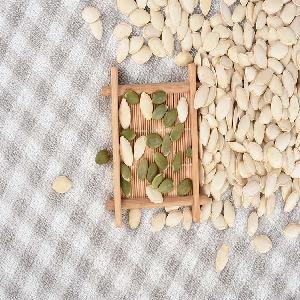  export  shiny  pumpkin   seeds  and peeled green kernels