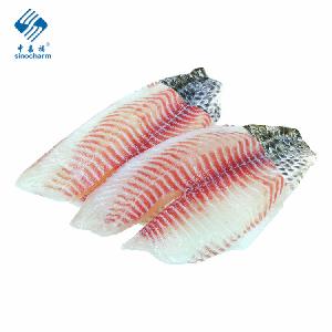 Sinocharm Skin on Tail Tilapia Fillet Frozen IQF Tilapia